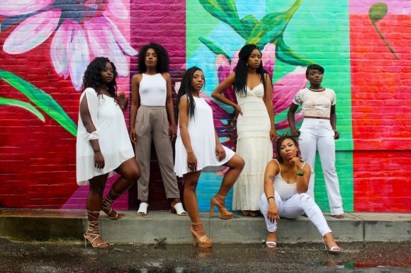 On-trend Prints - six women wearing white pants posing